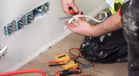 electrical repair services being done by an electrical technician