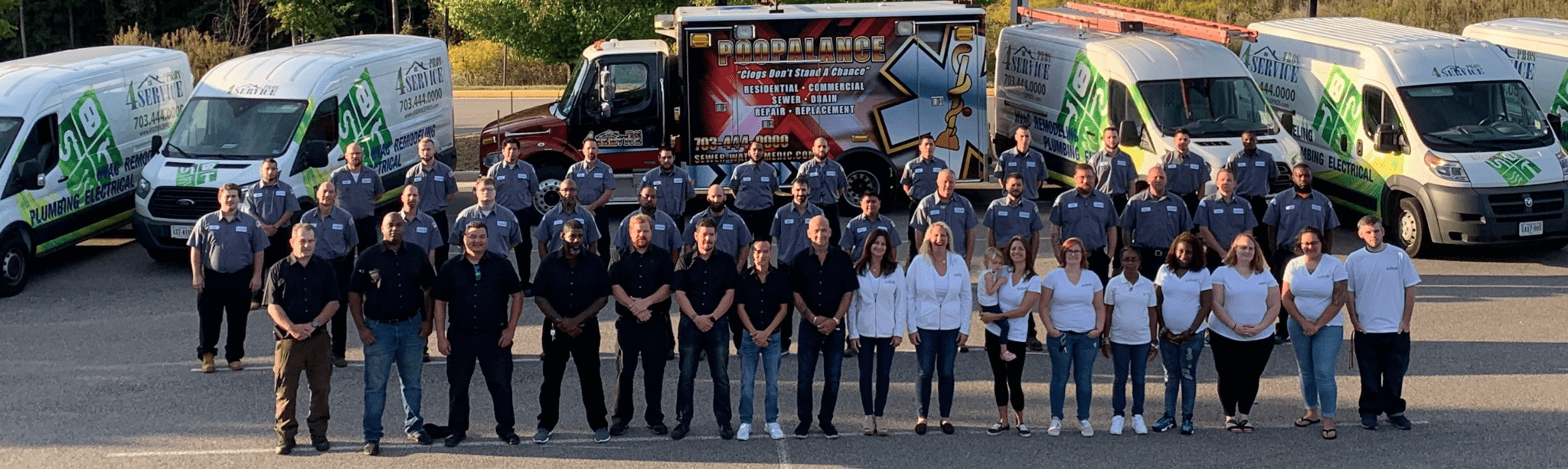 employees posing for a company photo