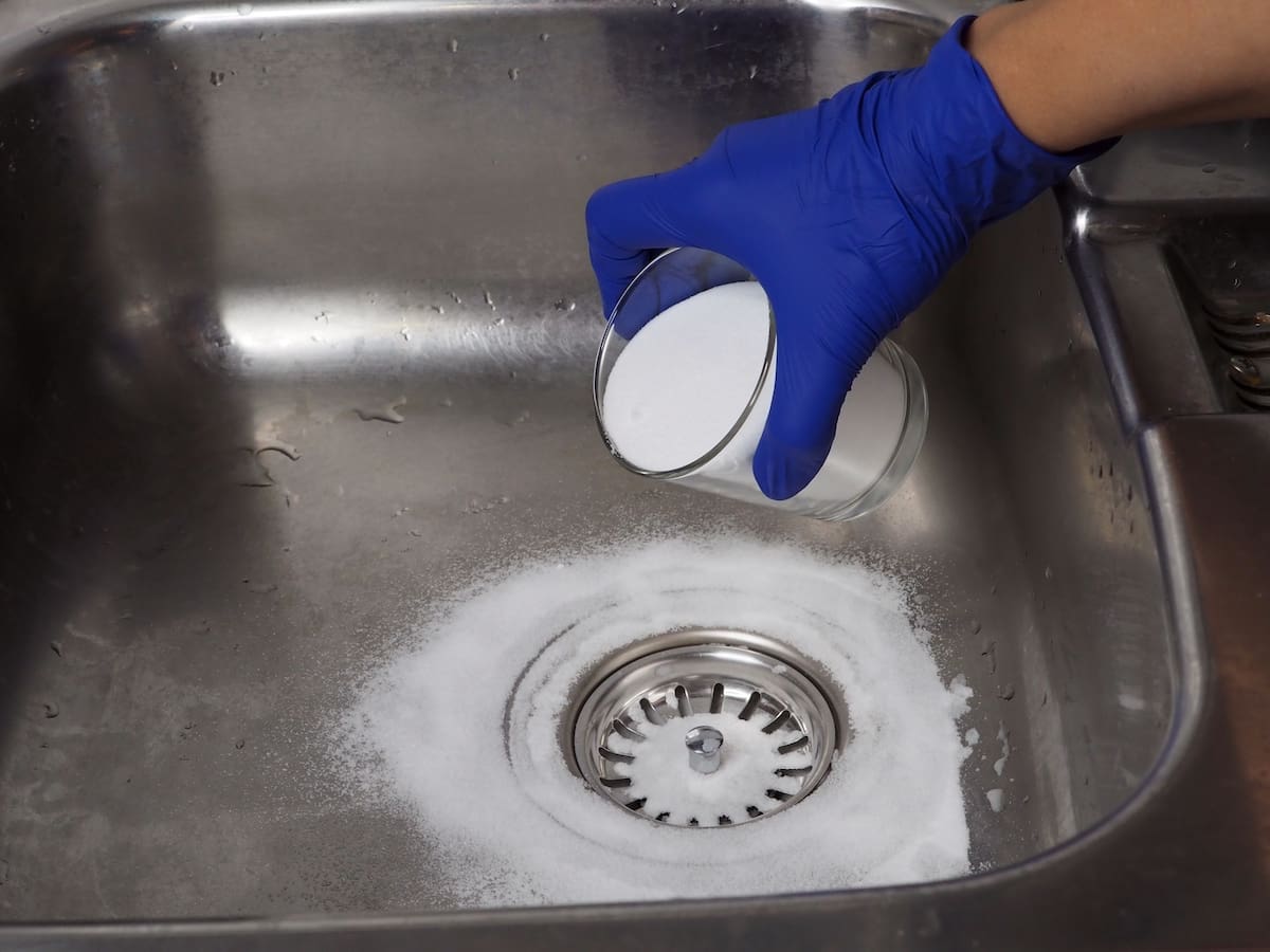 Pour Baking Soda Down Drain to Eliminate Sewer Gas Smell